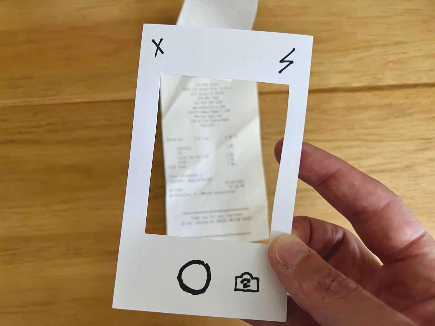 A low-fidelity paper prototype of the receipt capture feature.